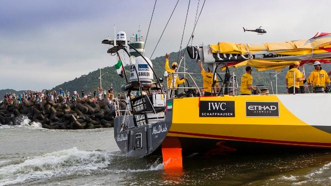 ADOR Navigator Simon Fisher and Daryl Wislang wave to the thousands of spectators lining the Itajai rocks - Volvo Ocean Race 2015 &copy;  Ian Roman / Abu Dhabi Ocean Racing